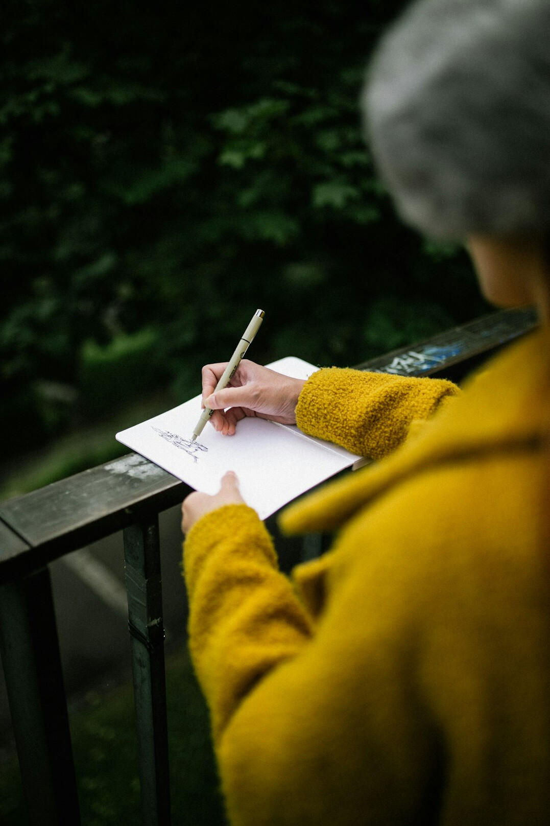 woman writing in journal
