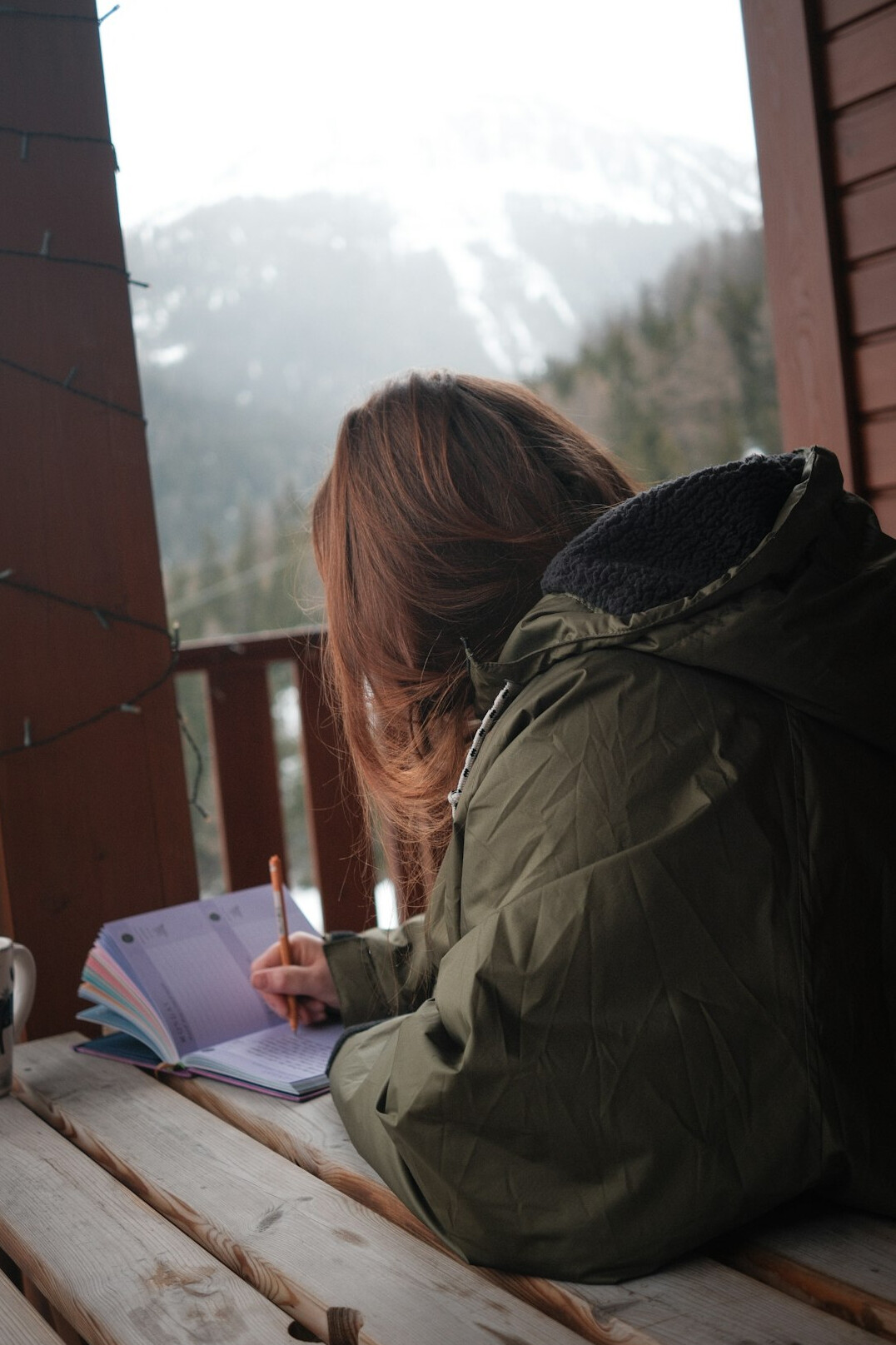 woman writing in journal