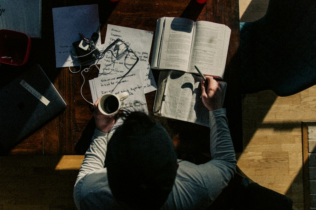 person journaling in morning