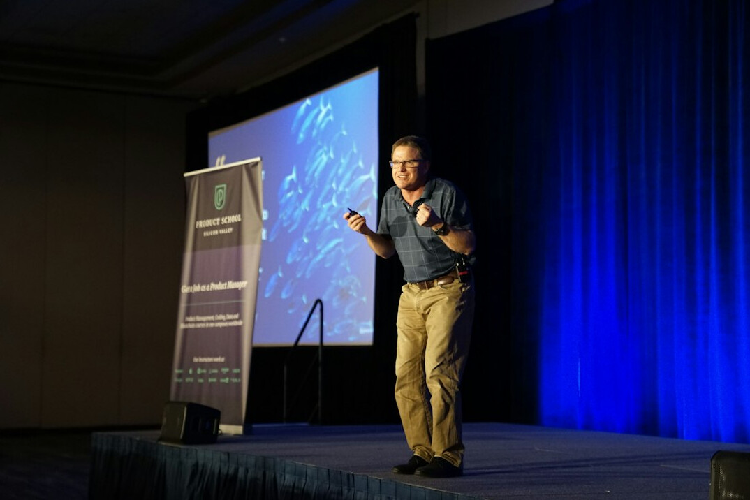 confident speaker on stage